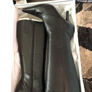 Nine West Urzulas black leather boots.